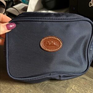 a navy blue Longchamp Lufthansa First Class amenity bag/pouch
